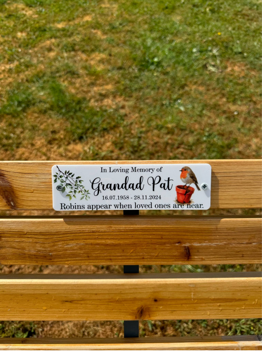 Robins appear when loved ones are near memorial bench plaque