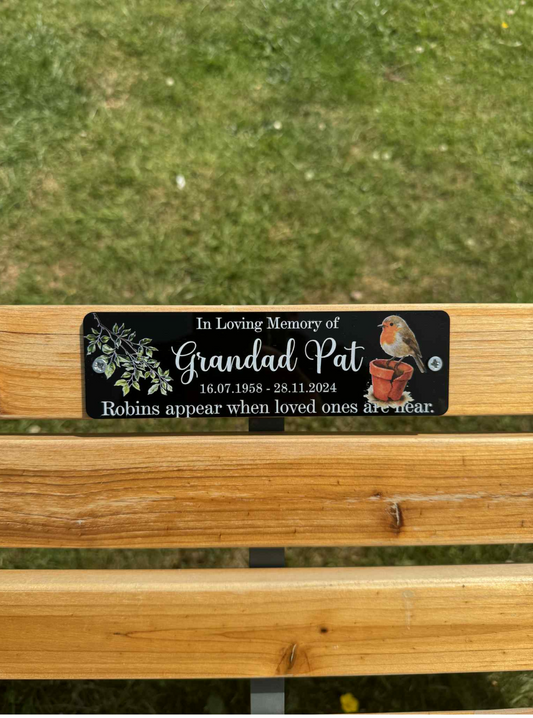 Robins appear when loved ones are near memorial bench plaque