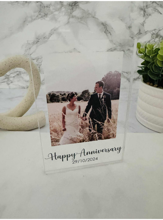 Acrylic photo block with writing.