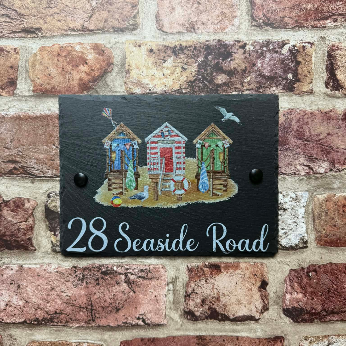 Beach huts slate house sign