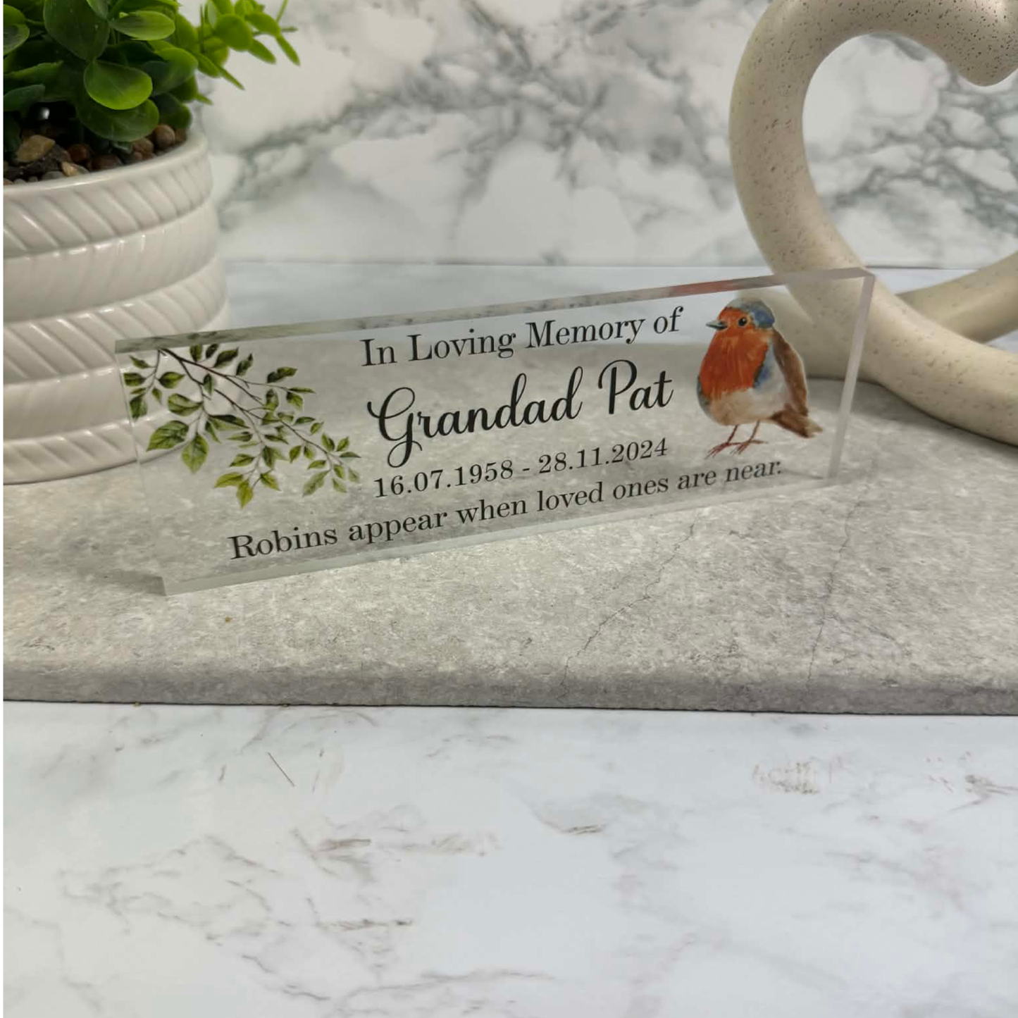 Robins appear when loved ones are near memorial freestanding